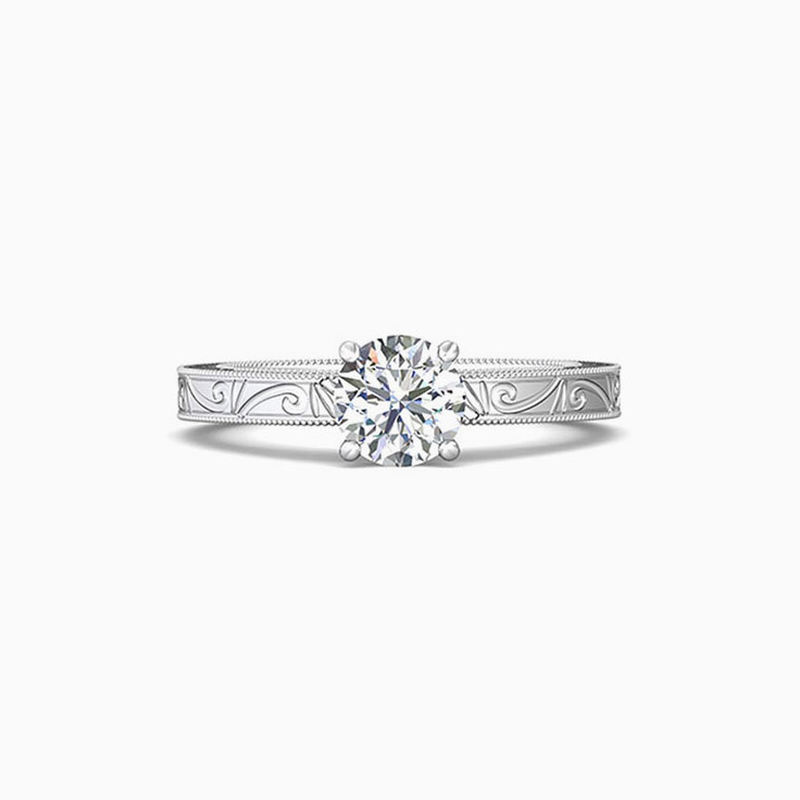 Carved engagement ring